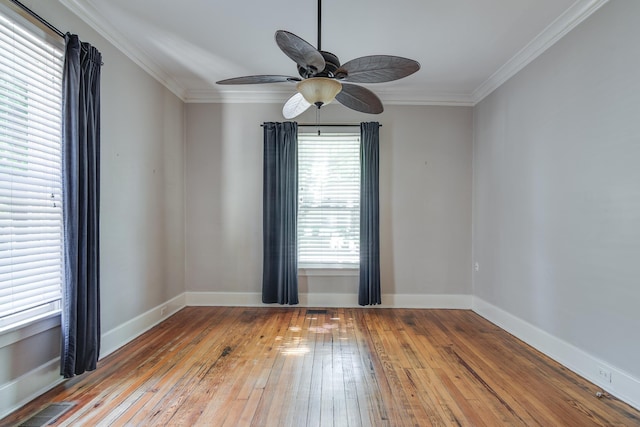 699 New York St, Memphis, TN 38104 - empty room featuring wood-type flooring, a ceiling fan, and ornamental molding