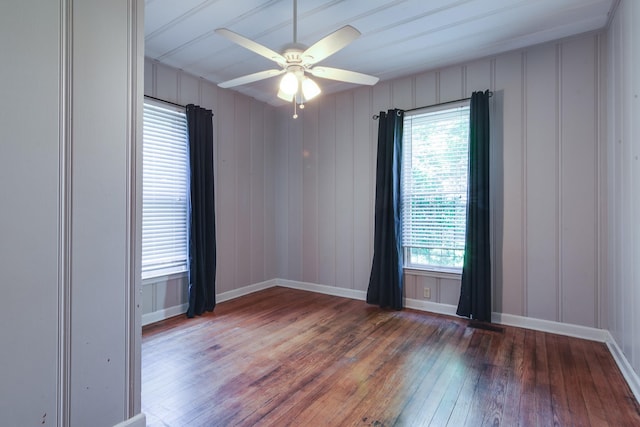 699 New York St, Memphis, TN 38104 - spare room with hardwood / wood-style floors, a ceiling fan, and a decorative wall