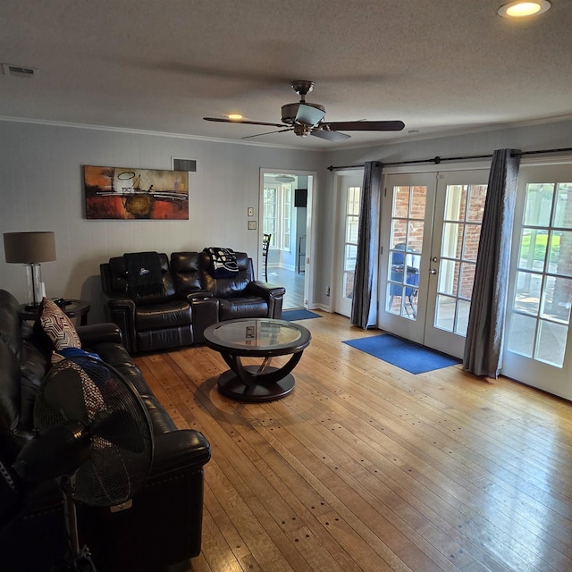 6380 Davidson Cv, Memphis, TN 38119 - living room with french doors, crown molding, ceiling fan, light wood-style floors, and recessed lighting