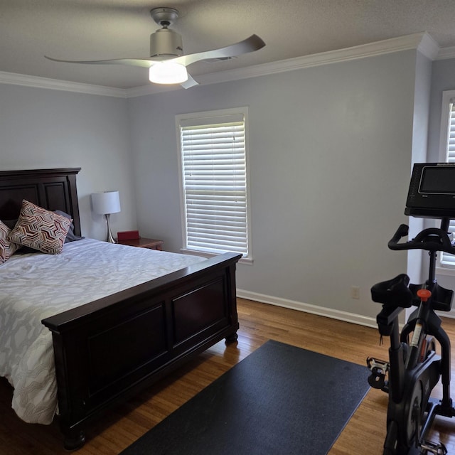 6380 Davidson Cv, Memphis, TN 38119 - bedroom with ornamental molding, multiple windows, dark wood-type flooring, and ceiling fan