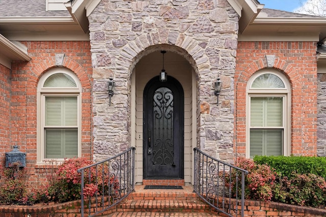 536 Warwick Willow Ln, Collierville, TN 38017 - entrance to property with a shingled roof, brick siding, and stone siding