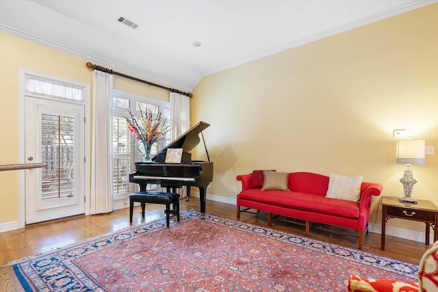536 Warwick Willow Ln, Collierville, TN 38017 - sitting room with crown molding and wood finished floors