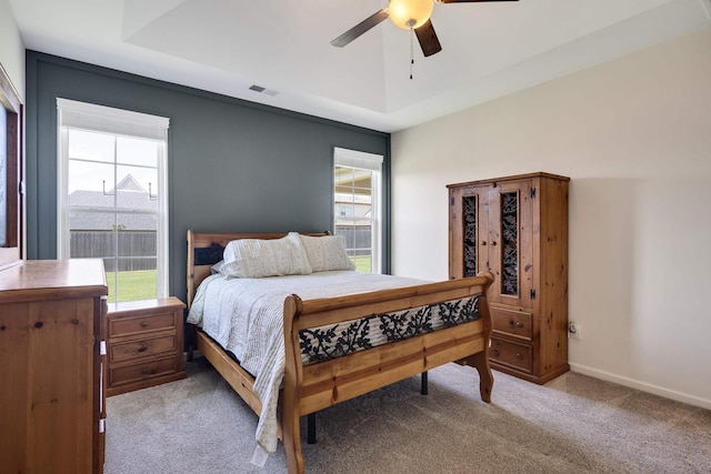 50 Misty Meadow Ln, Oakland, TN 38060 - bedroom with carpet floors, multiple windows, a raised ceiling, and ceiling fan