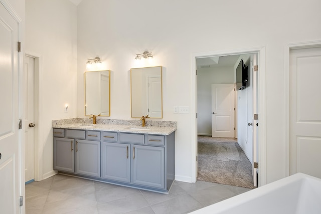 50 Misty Meadow Ln, Oakland, TN 38060 - full bathroom featuring double vanity, tile patterned floors, and a tub