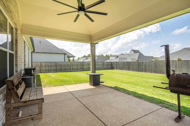 50 Misty Meadow Ln, Oakland, TN 38060 - fenced backyard with a ceiling fan, a patio, and grilling area