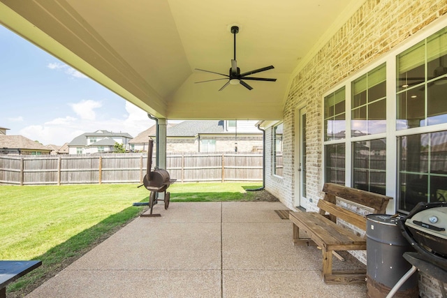 50 Misty Meadow Ln, Oakland, TN 38060 - fenced backyard with a patio, ceiling fan, grilling area, and entry steps