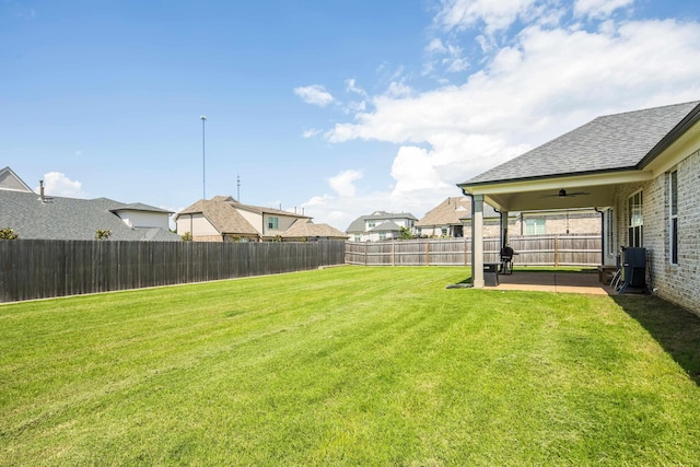 50 Misty Meadow Ln, Oakland, TN 38060 - fenced backyard with ceiling fan, a patio area, and a residential view