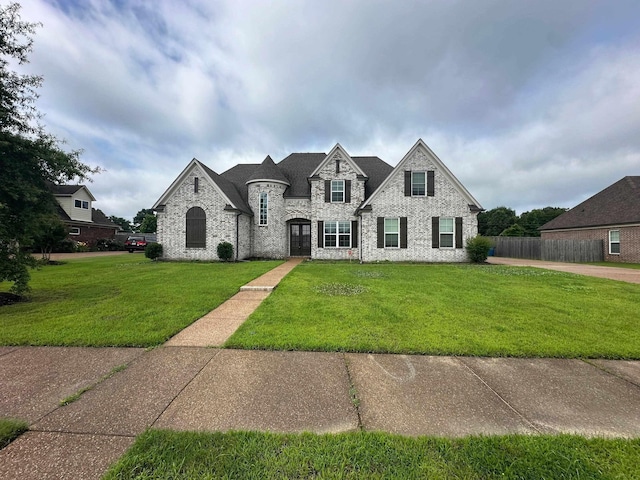 4689 Riva Ridge Dr, Olive Branch, MS 38654 - french country home featuring stone siding and brick siding