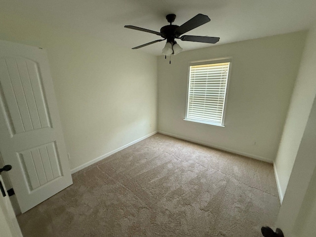 4689 Riva Ridge Dr, Olive Branch, MS 38654 - empty room featuring carpet flooring and a ceiling fan