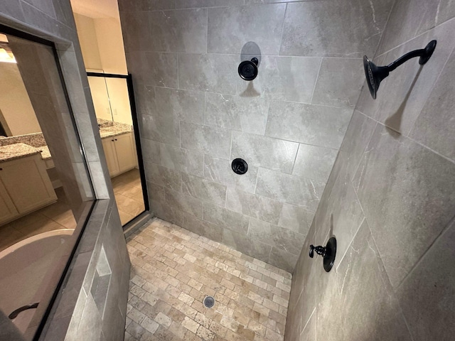 4689 Riva Ridge Dr, Olive Branch, MS 38654 - full bathroom featuring vanity and tiled shower