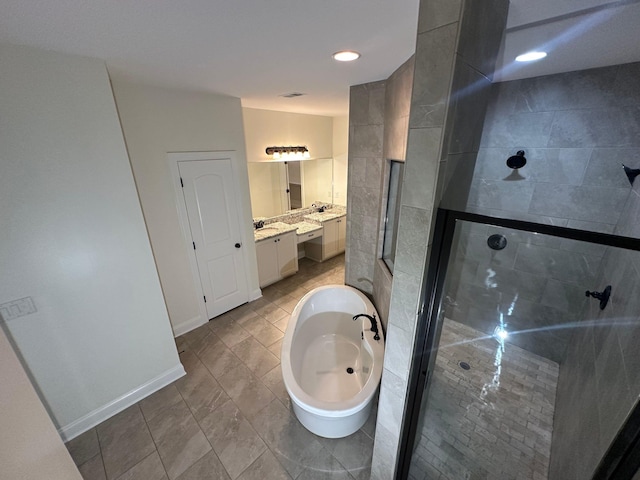 4689 Riva Ridge Dr, Olive Branch, MS 38654 - bathroom with a stall shower, vanity, a garden tub, and recessed lighting