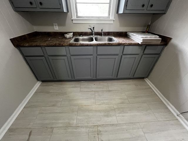 4316 Zelda Ln, Memphis, TN 38122 - kitchen featuring gray cabinets and dark countertops