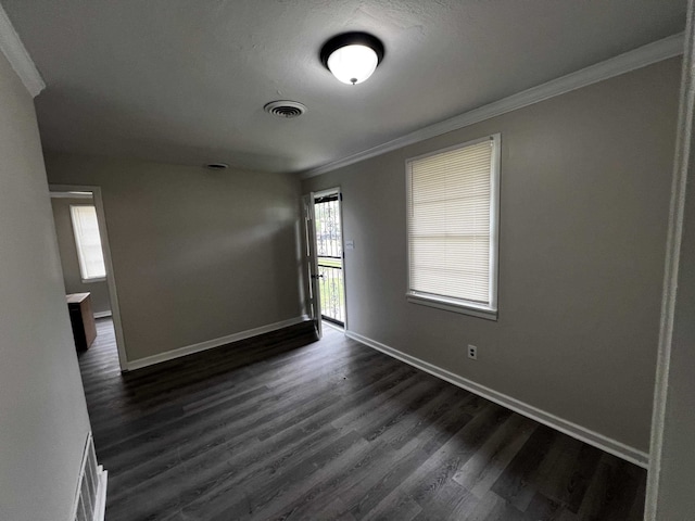 4316 Zelda Ln, Memphis, TN 38122 - spare room featuring crown molding and dark wood-style flooring