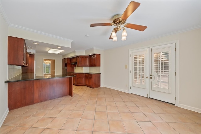 881 S Perkins Rd, Memphis, TN 38117 - kitchen with ornamental molding, a peninsula, dark countertops, french doors, and ceiling fan