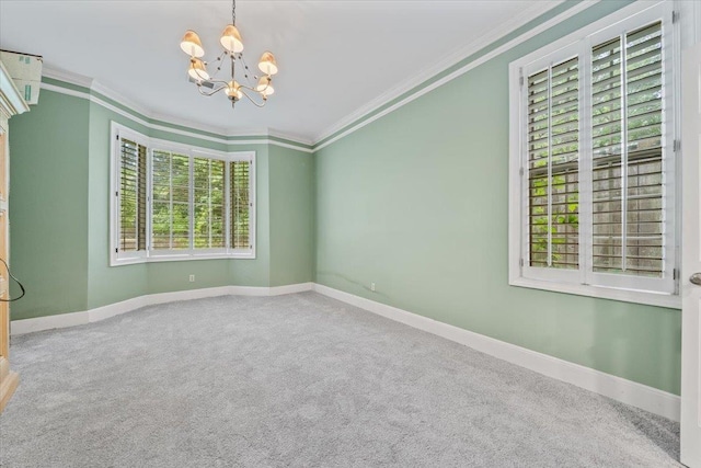 881 S Perkins Rd, Memphis, TN 38117 - spare room featuring a chandelier, crown molding, and carpet flooring