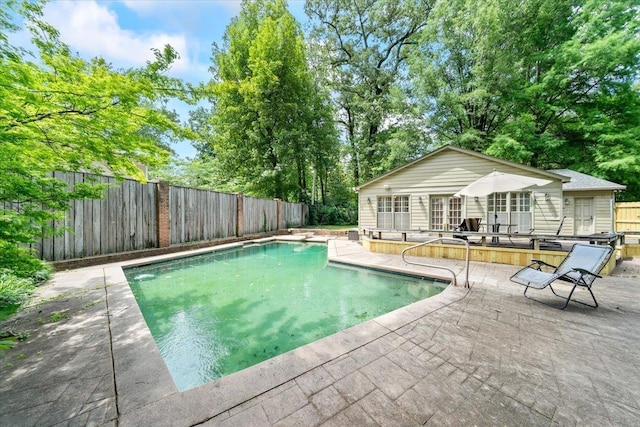 881 S Perkins Rd, Memphis, TN 38117 - view of swimming pool featuring a patio, a fenced backyard, and an outdoor structure