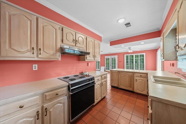 881 S Perkins Rd, Memphis, TN 38117 - kitchen featuring electric range, under cabinet range hood, light countertops, a peninsula, and tile patterned flooring