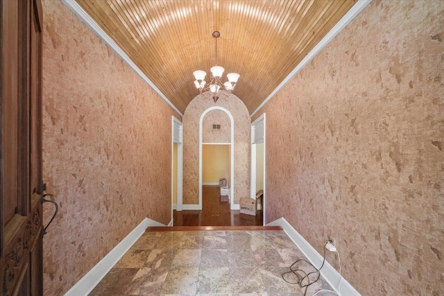 881 S Perkins Rd, Memphis, TN 38117 - unfurnished dining area featuring vaulted ceiling, a chandelier, crown molding, and a textured wall