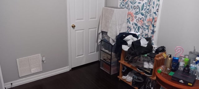 4100 Vaughn Ave, Memphis, TN 38122 - bedroom with dark wood-style floors and baseboards