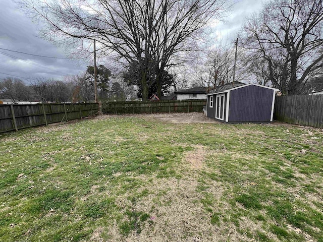 4267 Leroy Ave, Memphis, TN 38108 - fenced backyard featuring a storage shed