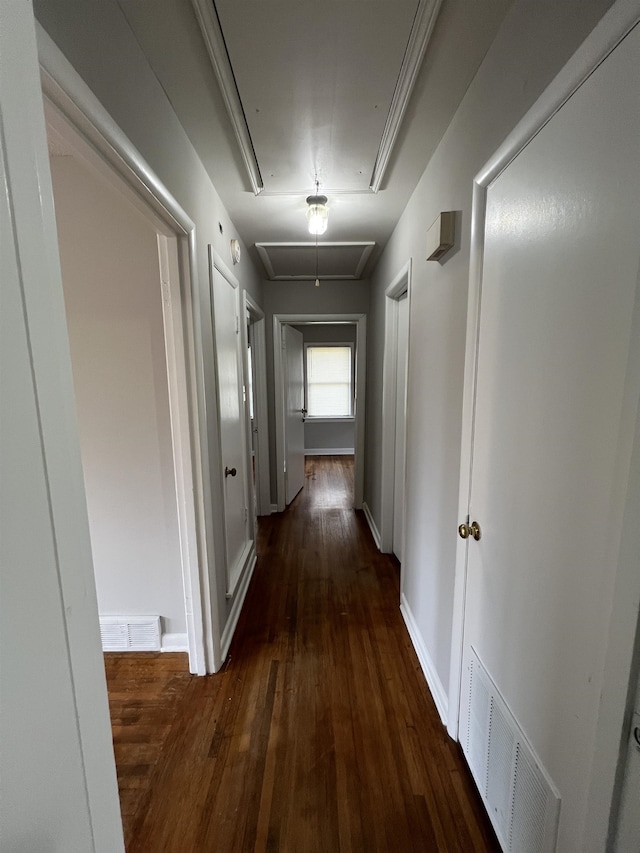 4267 Leroy Ave, Memphis, TN 38108 - corridor featuring attic access and dark wood-type flooring