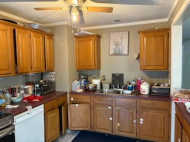 1235 Darlow St, Memphis, TN 38122 - kitchen with ceiling fan, brown cabinetry, white dishwasher, ornamental molding, and range