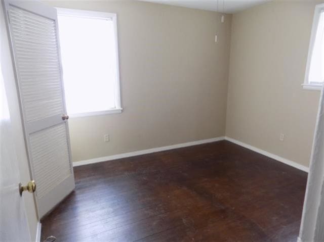 1106 Stratford Rd, Memphis, TN 38122 - empty room with wood finished floors and baseboards