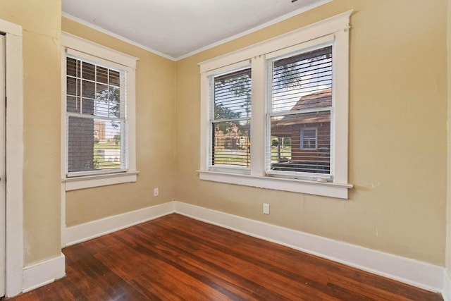 515 N Dunlap St, Memphis, TN 38105 - empty room featuring dark wood-style floors and ornamental molding