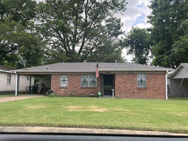 3035 Phyllis Ln, Memphis, TN 38118 - ranch-style house featuring brick siding, a front yard, concrete driveway, and a carport