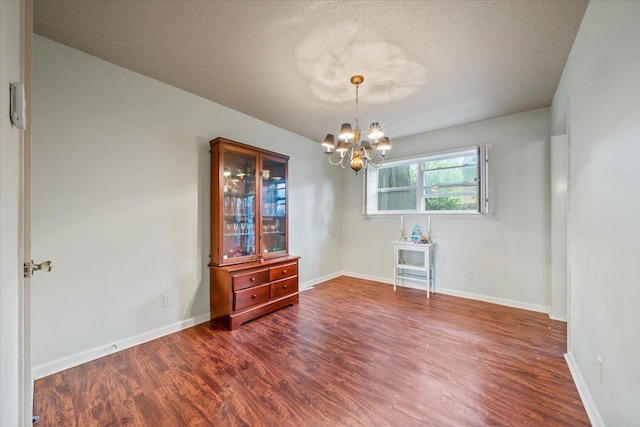 875 S Yates Rd Unit 4, Memphis, TN 38120 - unfurnished room with a chandelier and wood finished floors