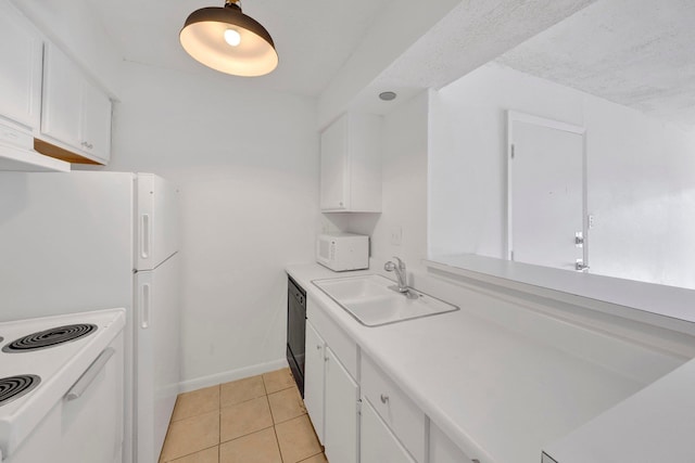 6787 Quail Hollow Ct Unit 4, Memphis, TN 38120 - kitchen featuring white appliances, white cabinets, light tile patterned flooring, and light countertops