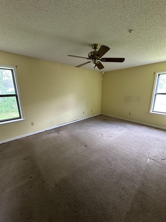 4607 Blue Willow Rd, Memphis, TN 38141 - unfurnished room with a ceiling fan, carpet flooring, and a textured ceiling