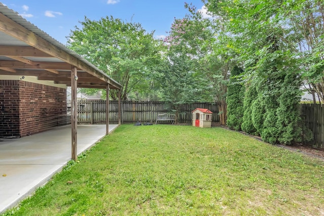 10215 N Green Moss Dr, Cordova, TN 38018 - fenced backyard featuring a patio area and a carport