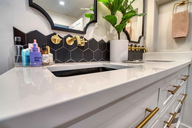 8986 Stratfield Cv, Germantown, TN 38139 - detailed view of decorative backsplash and a sink