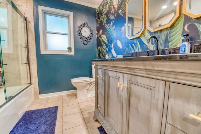 8986 Stratfield Cv, Germantown, TN 38139 - full bath featuring vanity, shower / bath combination with glass door, tile patterned flooring, and ornamental molding