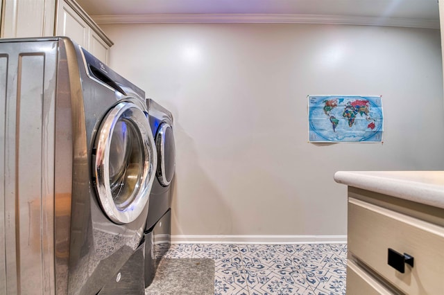 8986 Stratfield Cv, Germantown, TN 38139 - laundry area with washing machine and dryer, cabinet space, and ornamental molding
