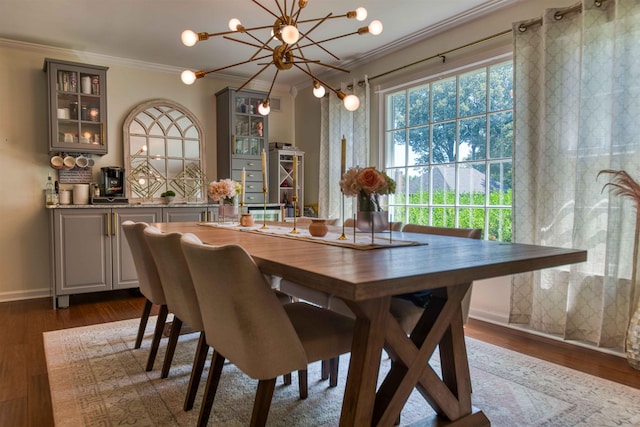 8986 Stratfield Cv, Germantown, TN 38139 - dining room with ornamental molding, dark wood finished floors, and a chandelier