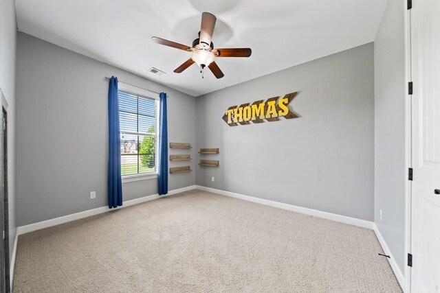 70 Shady Pine Cv, Oakland, TN 38060 - spare room with carpet flooring and ceiling fan