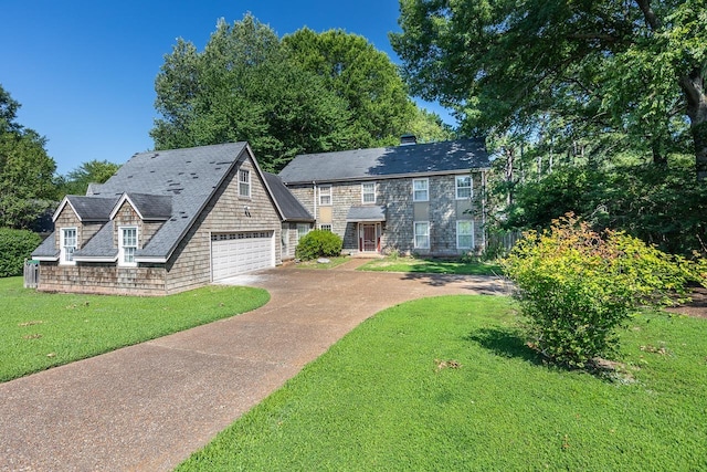 1361 Poplar Ridge Dr, Memphis, TN 38120 - view of front of house featuring driveway and a front lawn