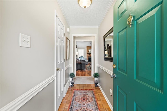 6445 Baird Ln, Bartlett, TN 38135 - entrance foyer with a textured ceiling and ornamental molding