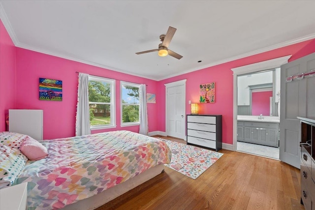 1978 Tutwiler Ave, Memphis, TN 38107 - bedroom featuring light wood-style flooring, ornamental molding, ceiling fan, and ensuite bath