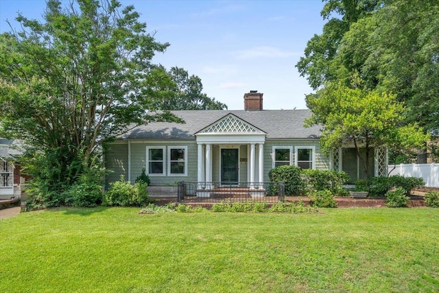 1978 Tutwiler Ave, Memphis, TN 38107 - view of front of property featuring a chimney and roof with shingles