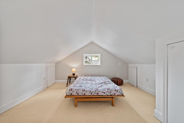 1978 Tutwiler Ave, Memphis, TN 38107 - carpeted bedroom featuring lofted ceiling and baseboards