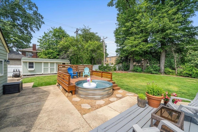 1978 Tutwiler Ave, Memphis, TN 38107 - view of patio / terrace featuring a shed and a deck
