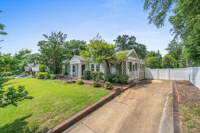 1978 Tutwiler Ave, Memphis, TN 38107 - view of front of home featuring concrete driveway and a gate