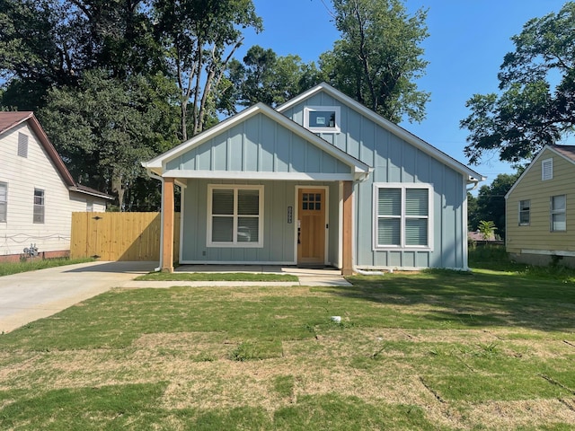 1998 Cloverdale Dr, Memphis, TN 38114 - bungalow with board and batten siding, a porch, and driveway