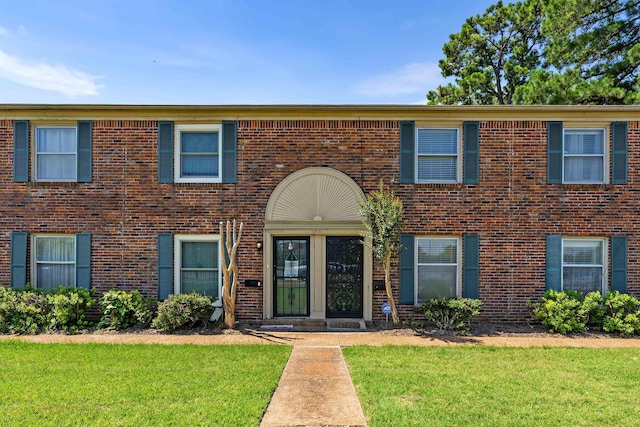 5841 Park Ave Unit 2, Memphis, TN 38119 - view of front facade with a front lawn and brick siding