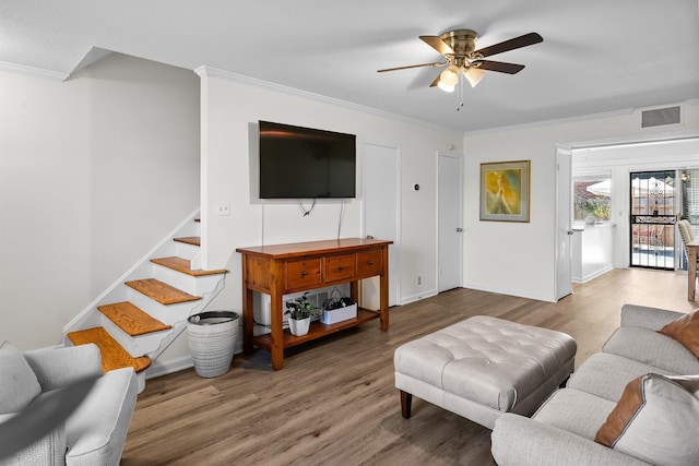5841 Park Ave Unit 2, Memphis, TN 38119 - living room featuring ornamental molding, wood finished floors, ceiling fan, and stairs