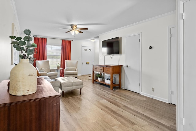 5841 Park Ave Unit 2, Memphis, TN 38119 - living room featuring ornamental molding, a ceiling fan, and light wood-style floors