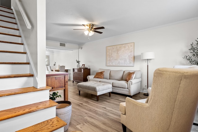 5841 Park Ave Unit 2, Memphis, TN 38119 - living area featuring ceiling fan, light wood-style flooring, crown molding, and stairway